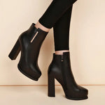 Black ankle-high heeled boots